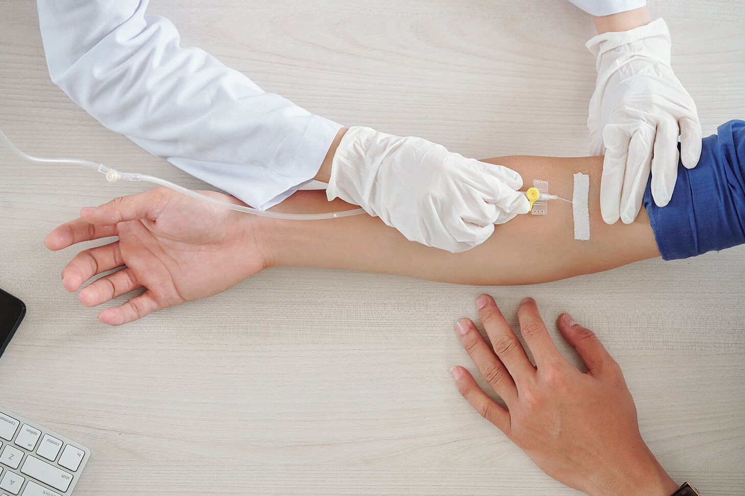 A patient receiving an IV drip.